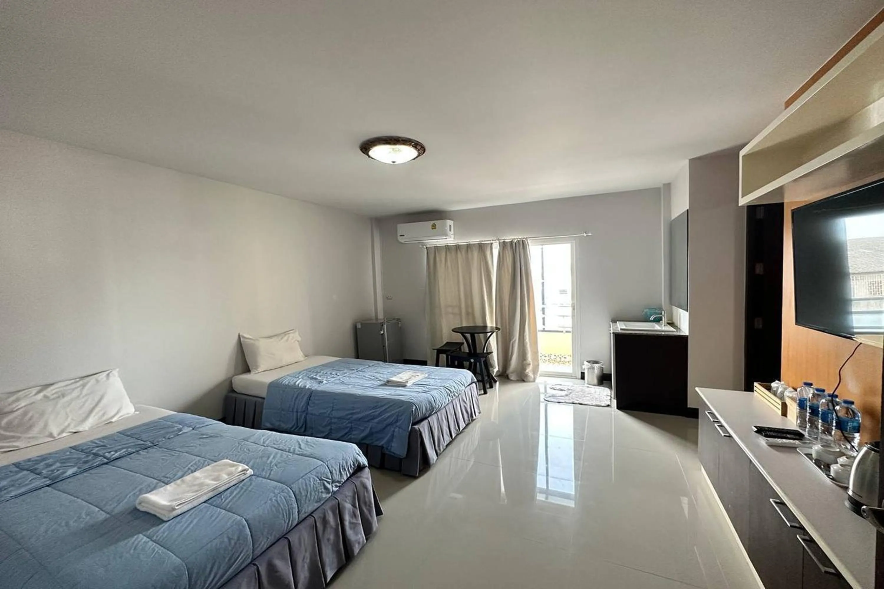 Bed in The Star Villa Resort