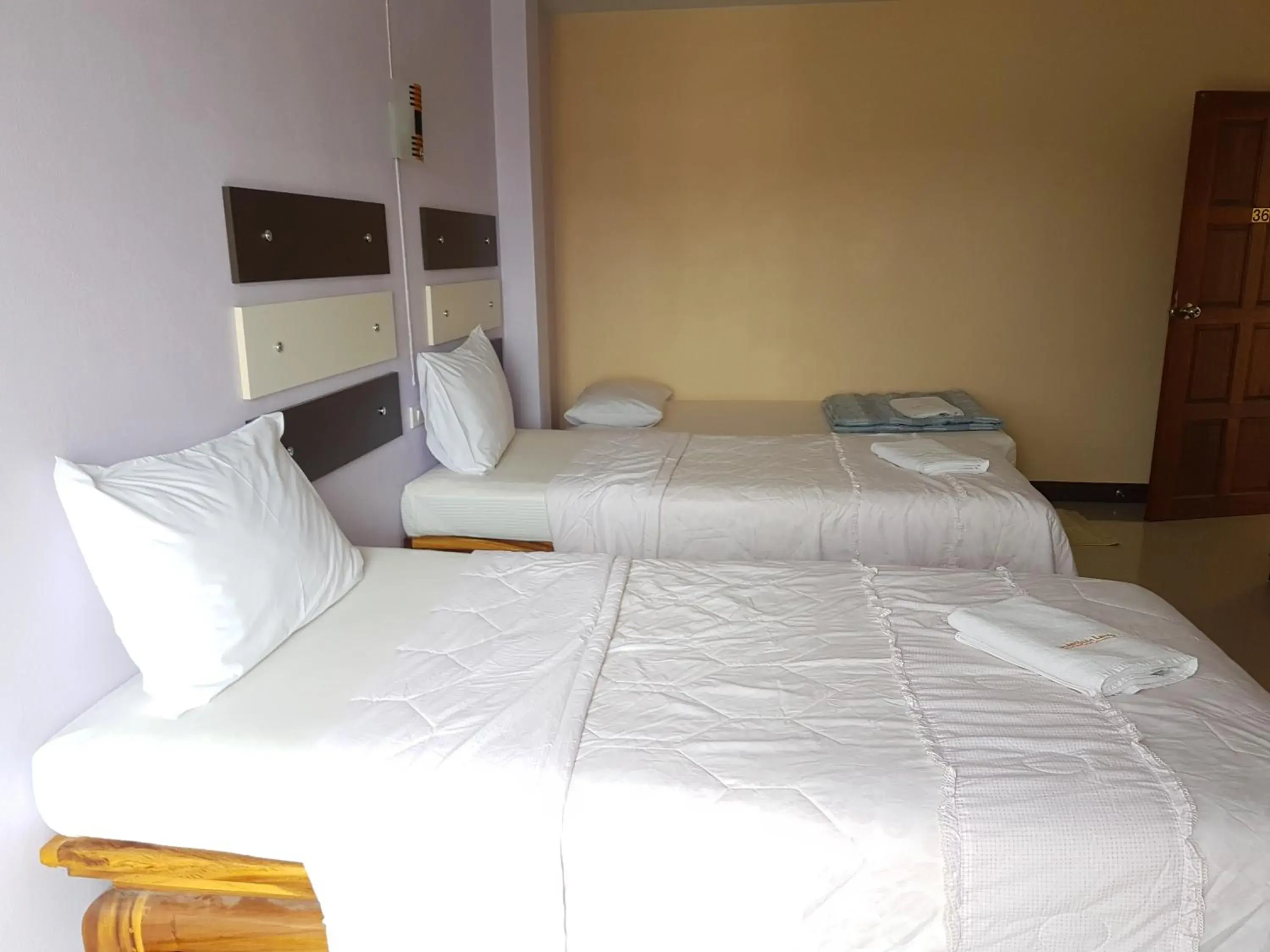 Bed in The Star Villa Resort Bed in The Star Villa Resort