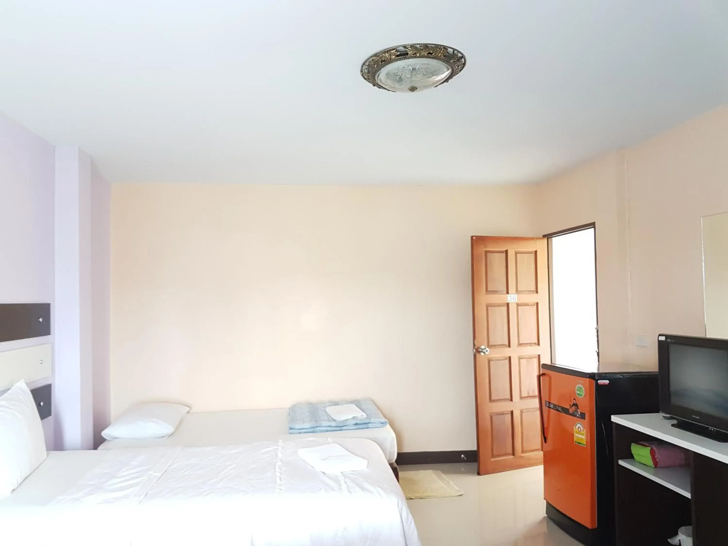 Bed in The Star Villa Resort Bed in The Star Villa Resort