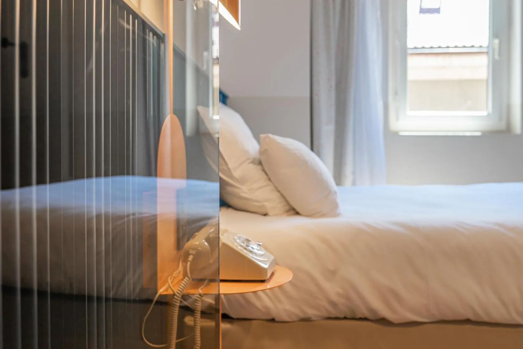 Bed in Hôtel du Palais de l'Isle