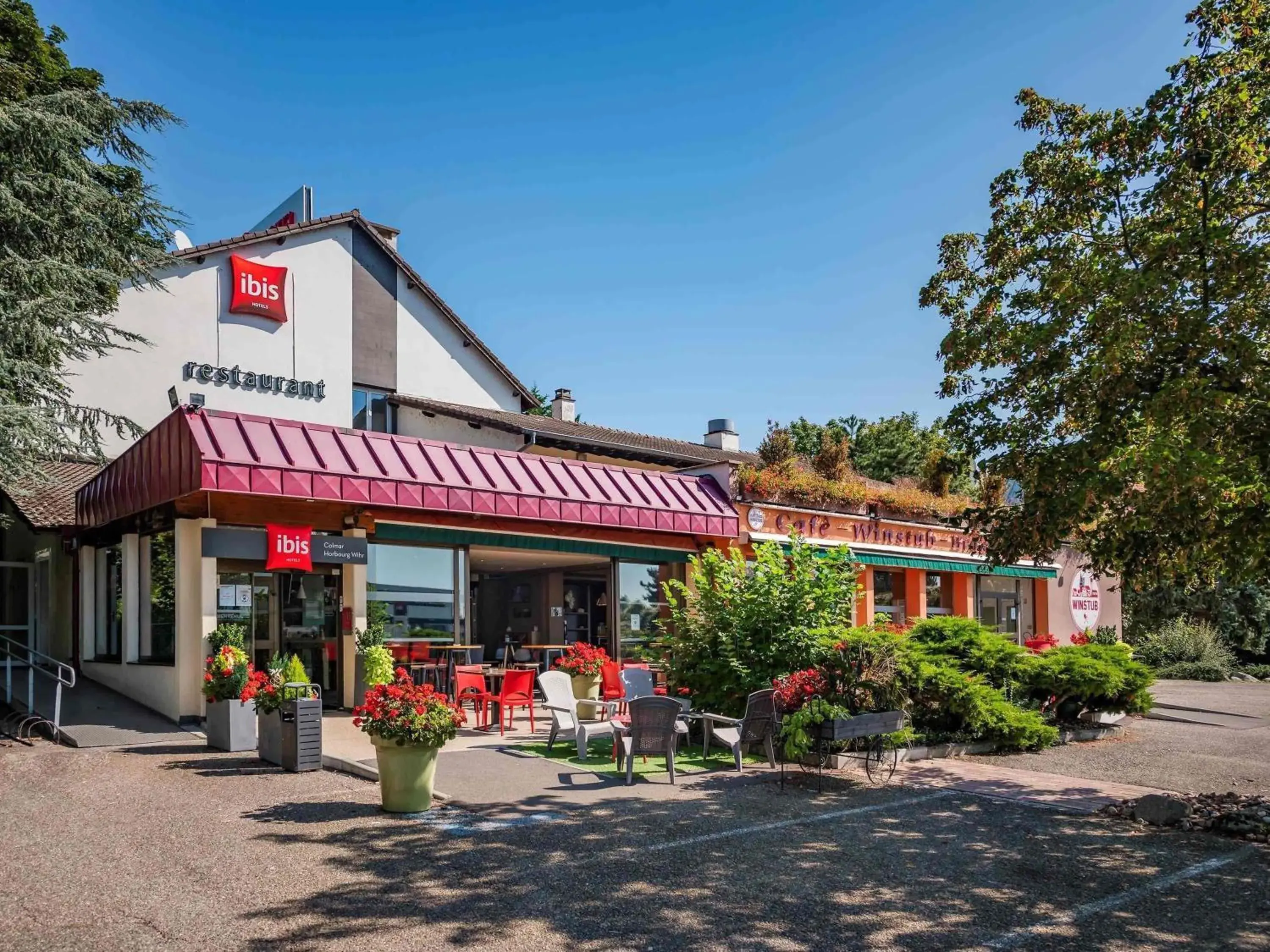 Property building in ibis Colmar Est - Hotel Restaurant en Alsace Property building in ibis Colmar Est - Hotel Restaurant en Alsace