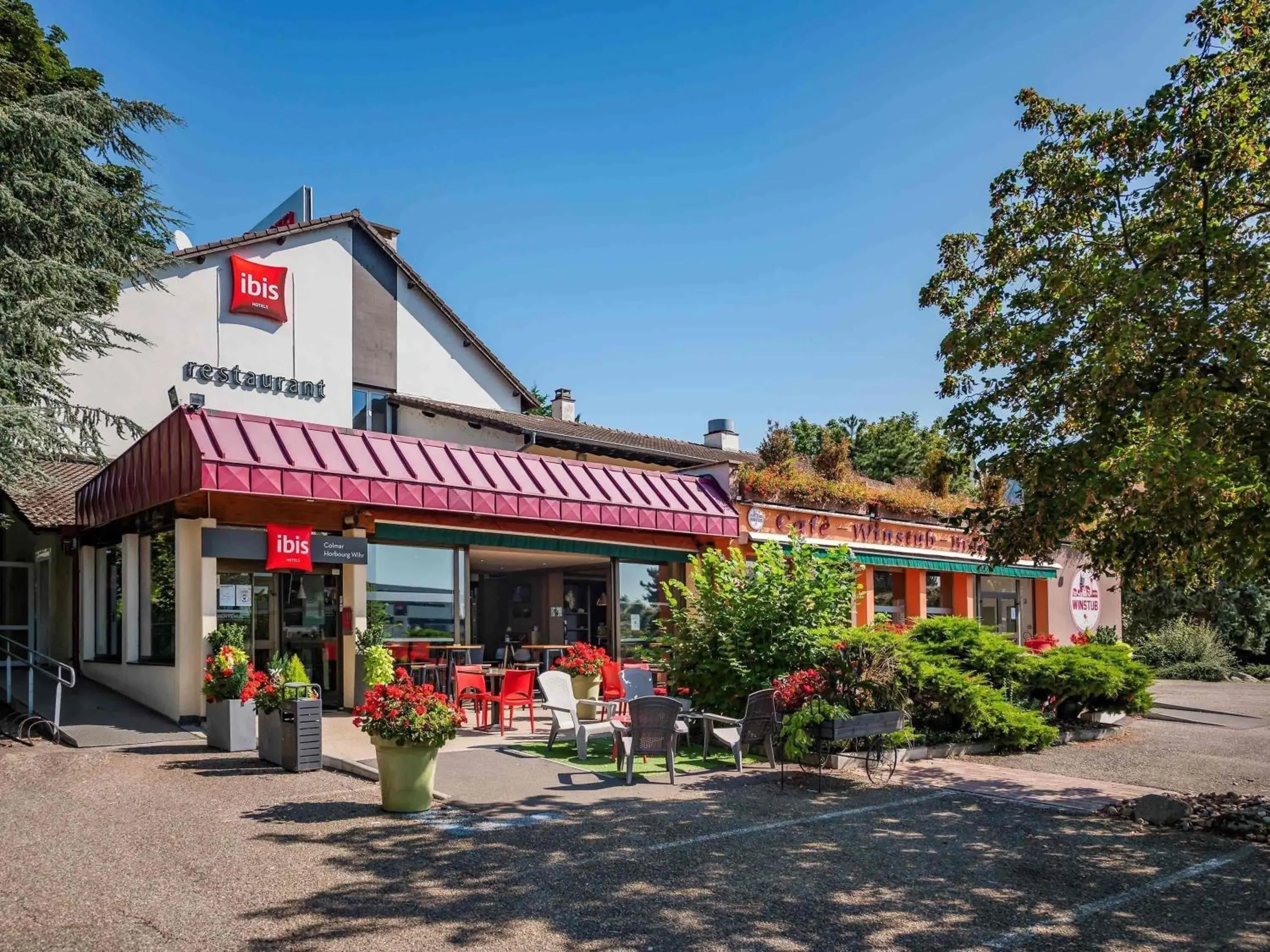 Property building in ibis Colmar Est - Hotel Restaurant en Alsace Property building in ibis Colmar Est - Hotel Restaurant en Alsace
