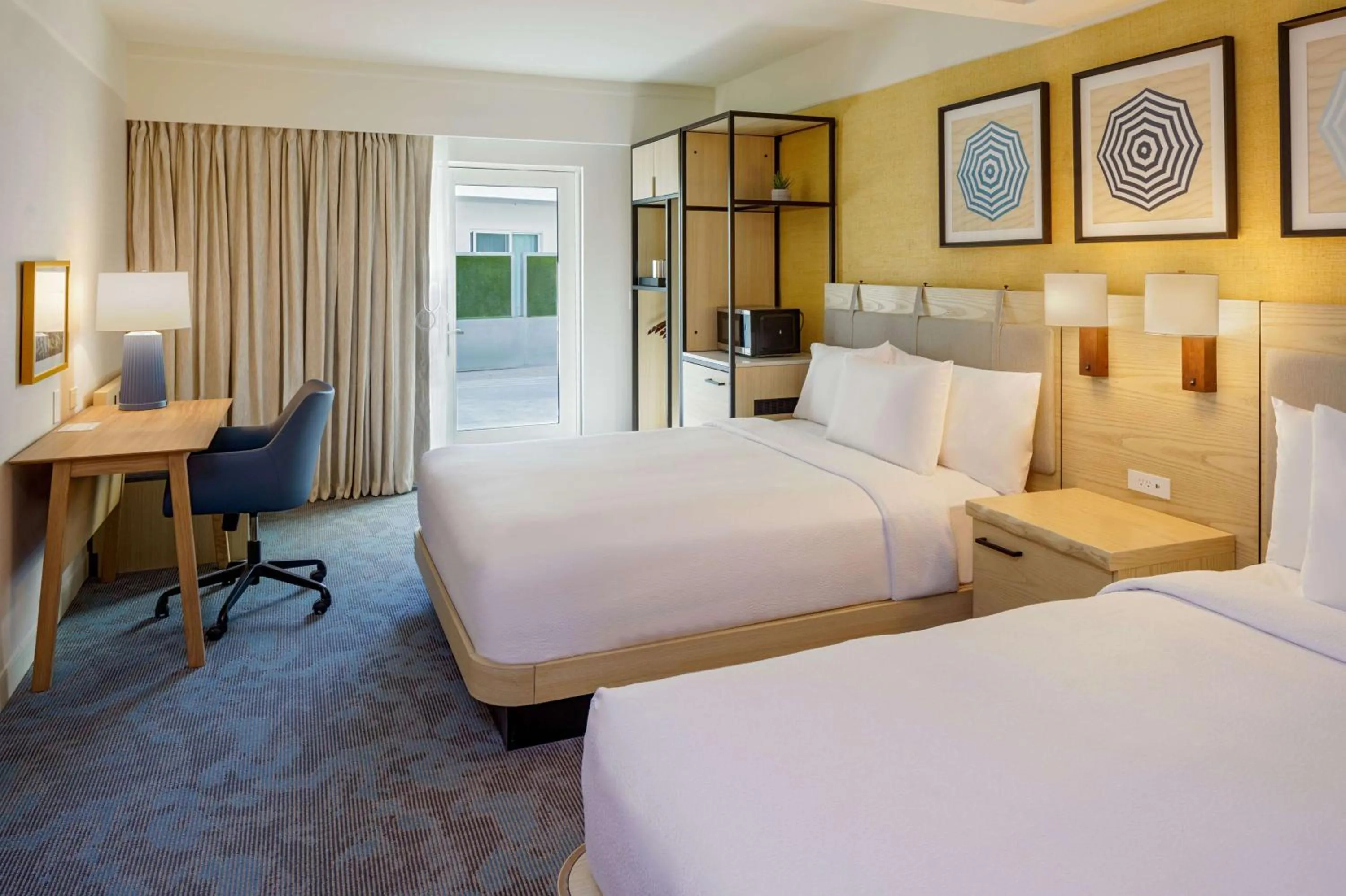 Bed in DoubleTree Suites by Hilton Doheny Beach