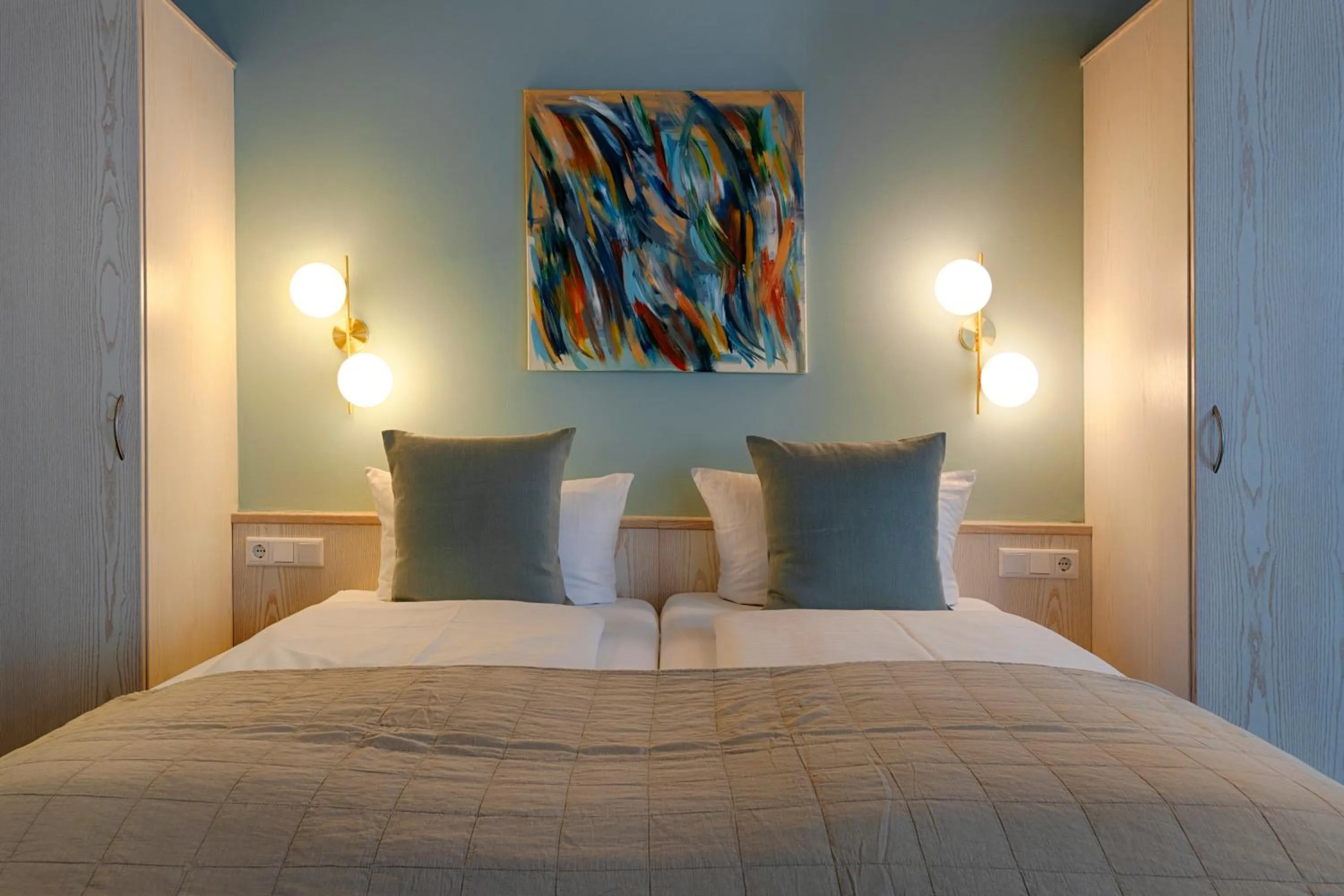 Bed in Hotel Kunterbunt - by homekeepers