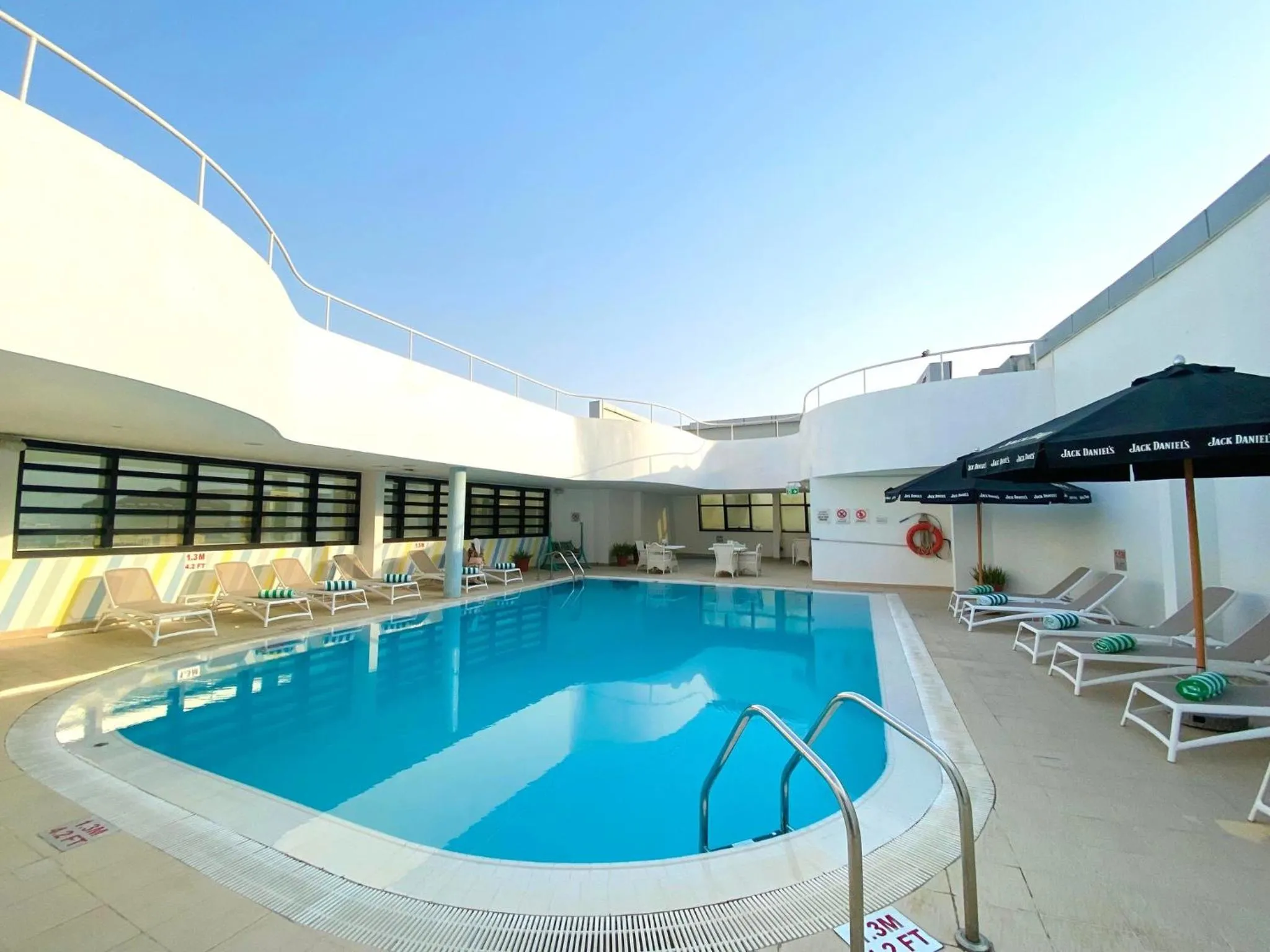 Swimming pool in Holiday Inn Abu Dhabi by IHG