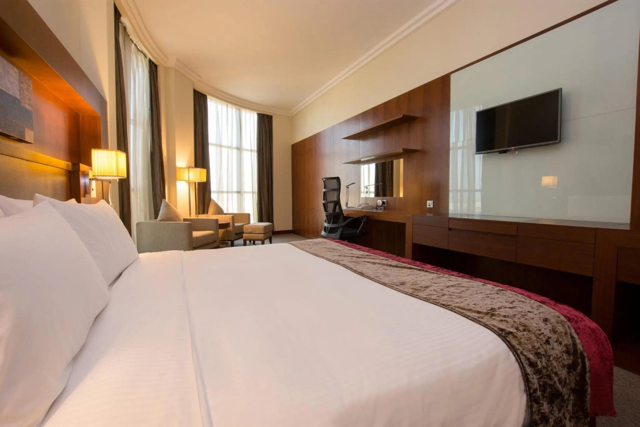 Photo of the whole room, Bed in Holiday Inn Abu Dhabi by IHG