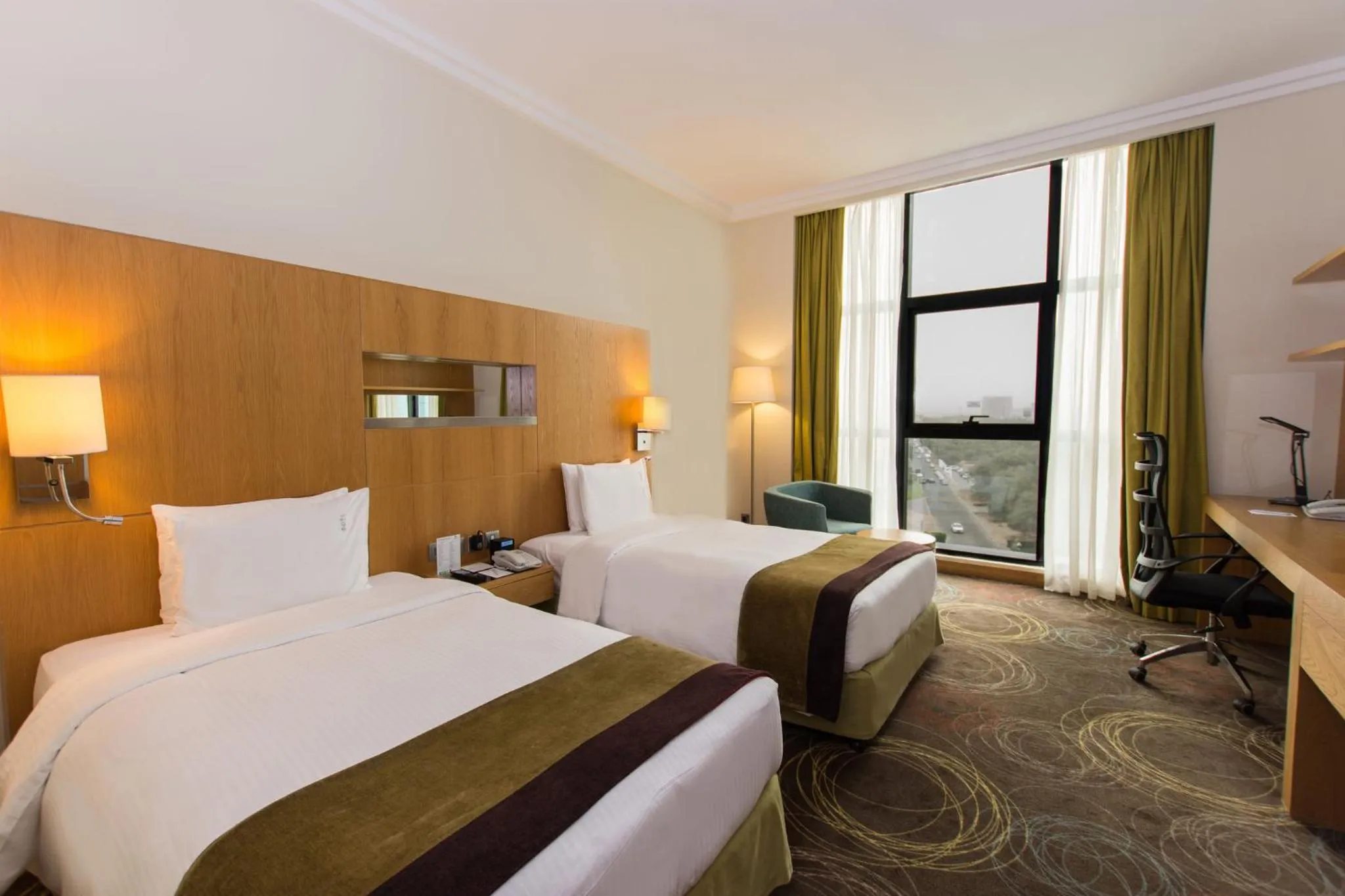 Photo of the whole room, Bed in Holiday Inn Abu Dhabi by IHG