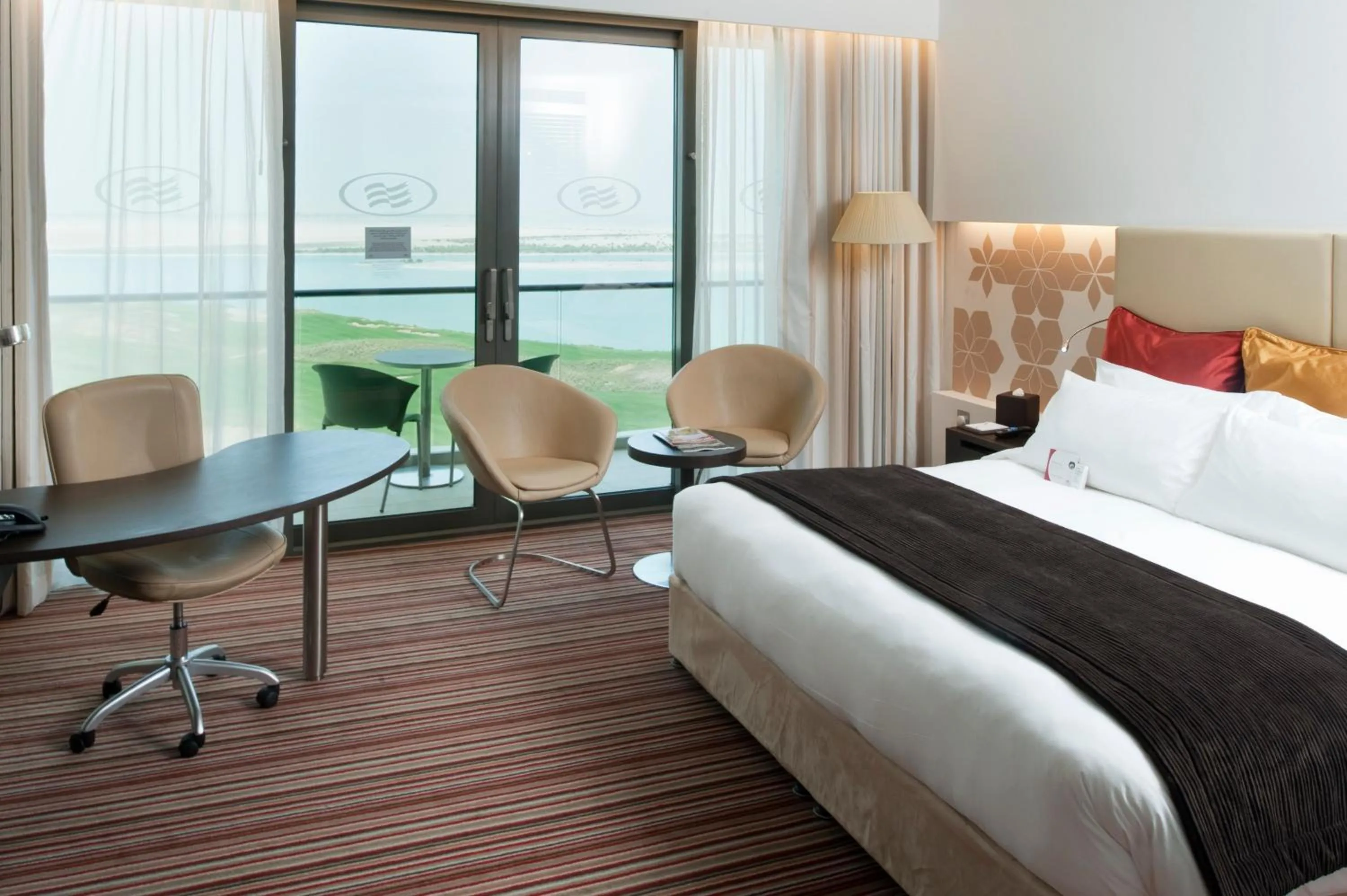 Photo of the whole room, Bed in Crowne Plaza Yas Island by IHG