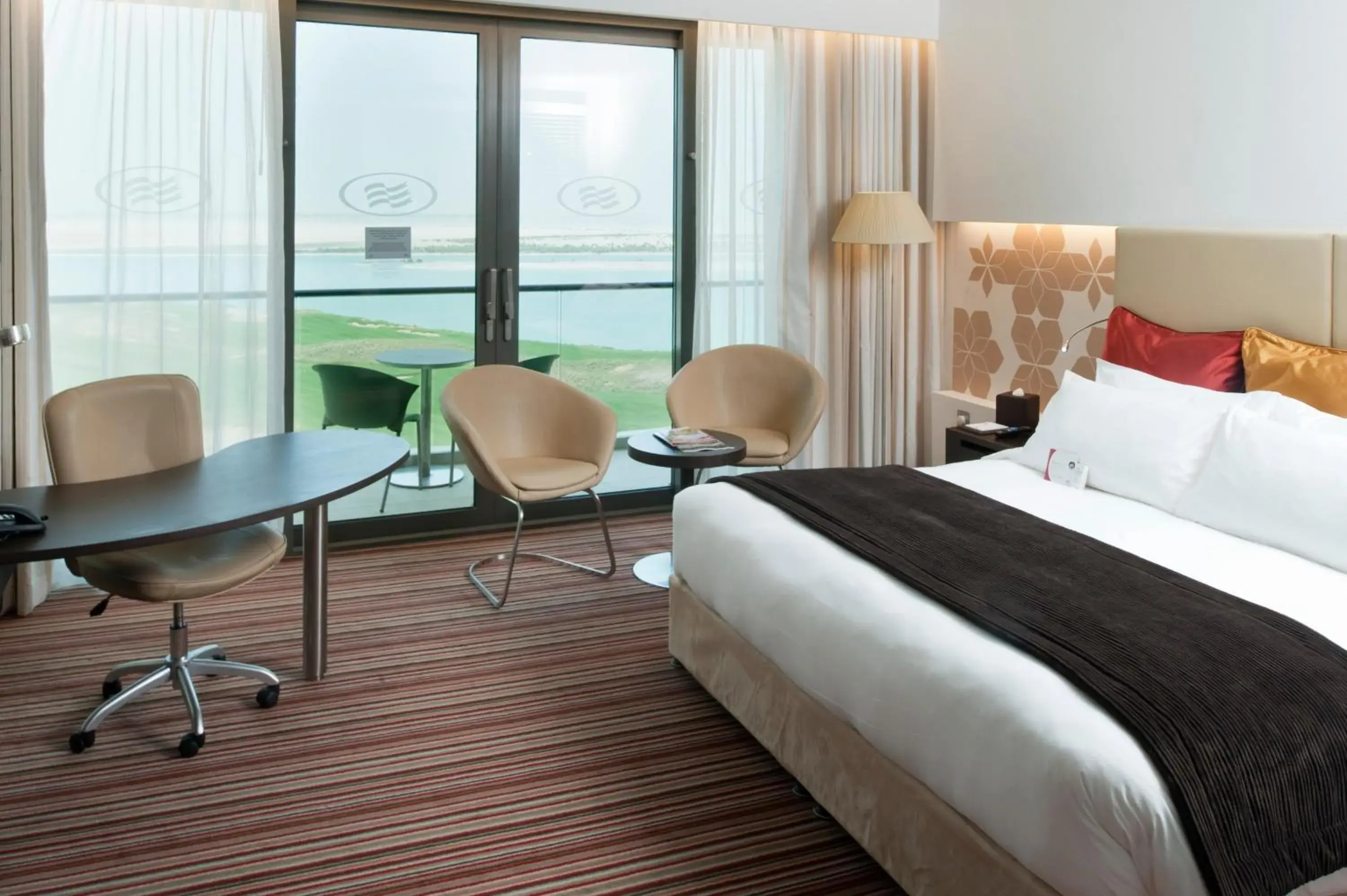 Photo of the whole room, Bed in Crowne Plaza Yas Island by IHG Photo of the whole room, Bed in Crowne Plaza Yas Island by IHG