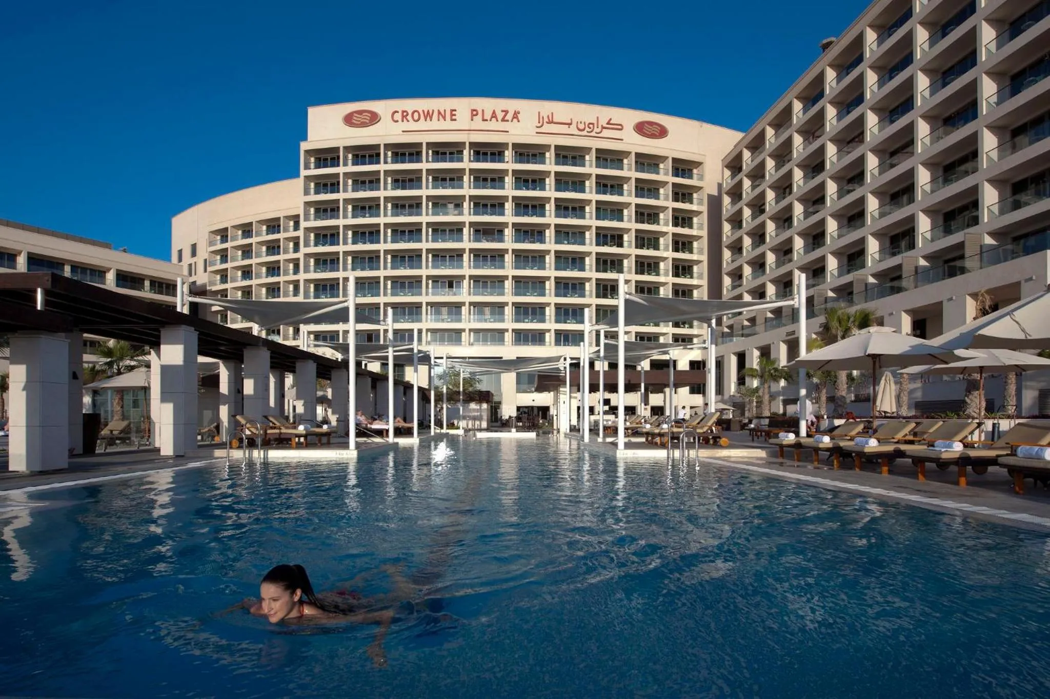 Swimming pool in Crowne Plaza Yas Island by IHG