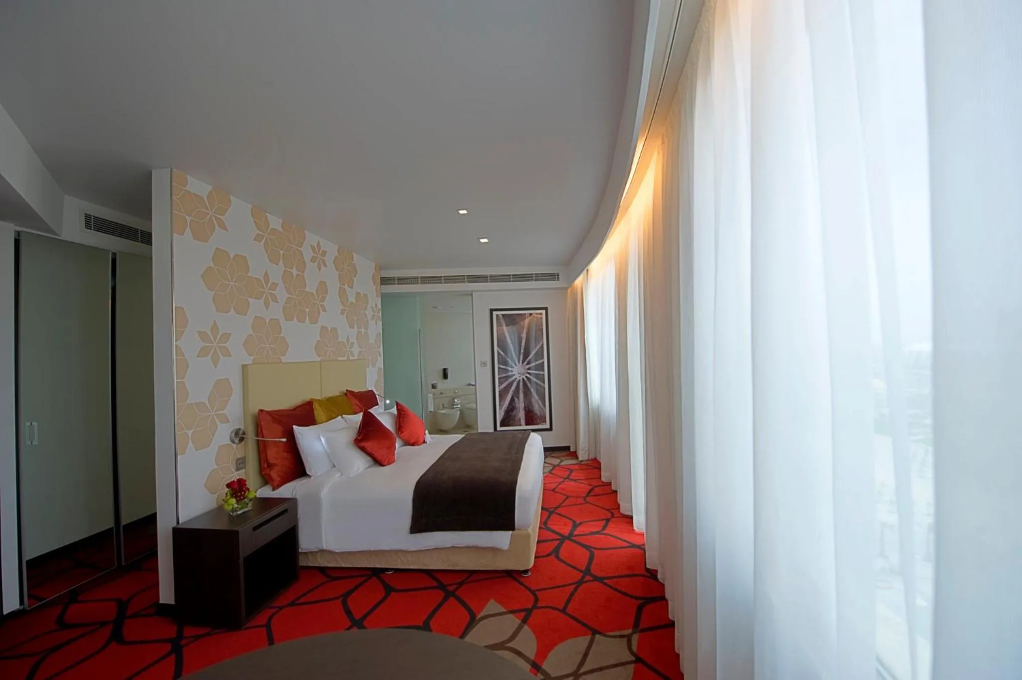 Photo of the whole room, Bed in Crowne Plaza Yas Island by IHG