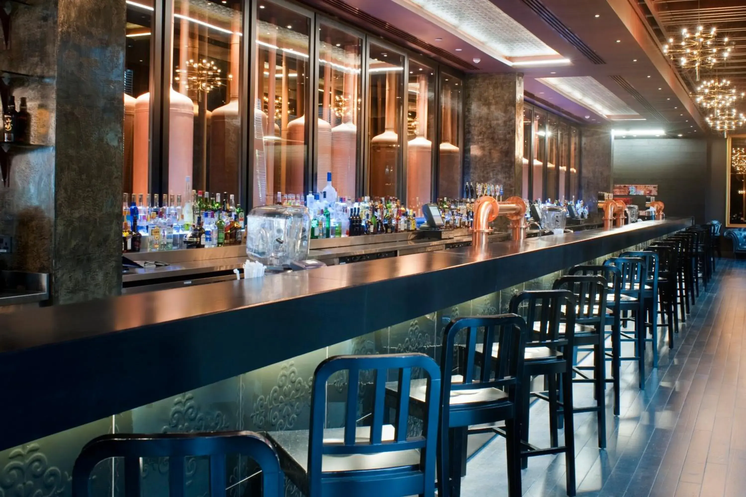Lounge or bar in Crowne Plaza Yas Island by IHG Lounge or bar in Crowne Plaza Yas Island by IHG