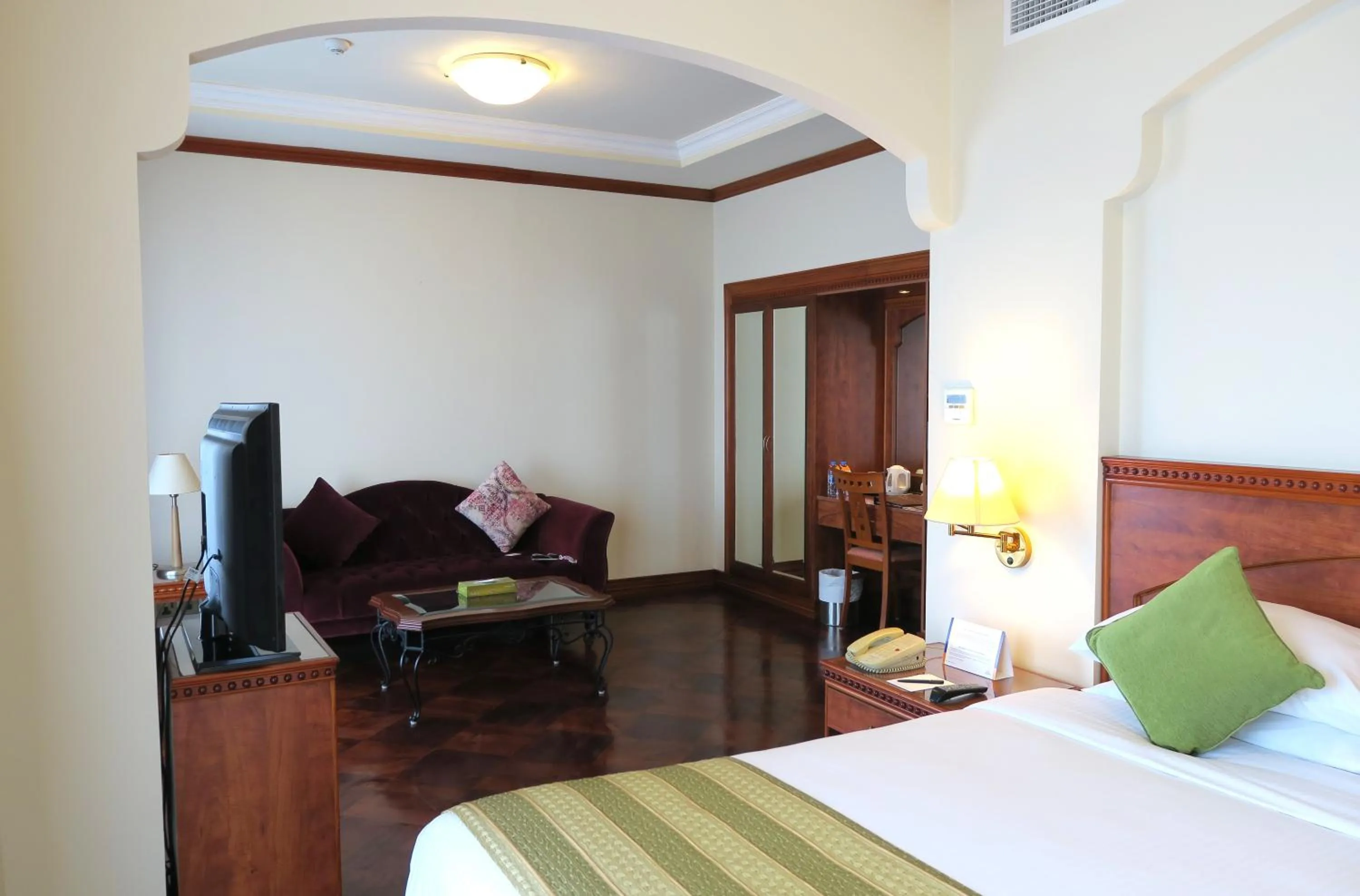 Seating area, Bed in Riviera Hotel