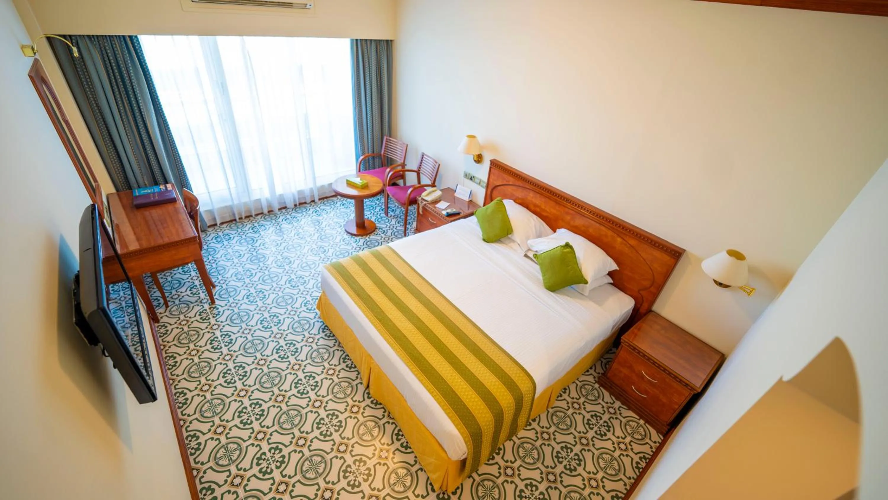 Bed in Riviera Hotel