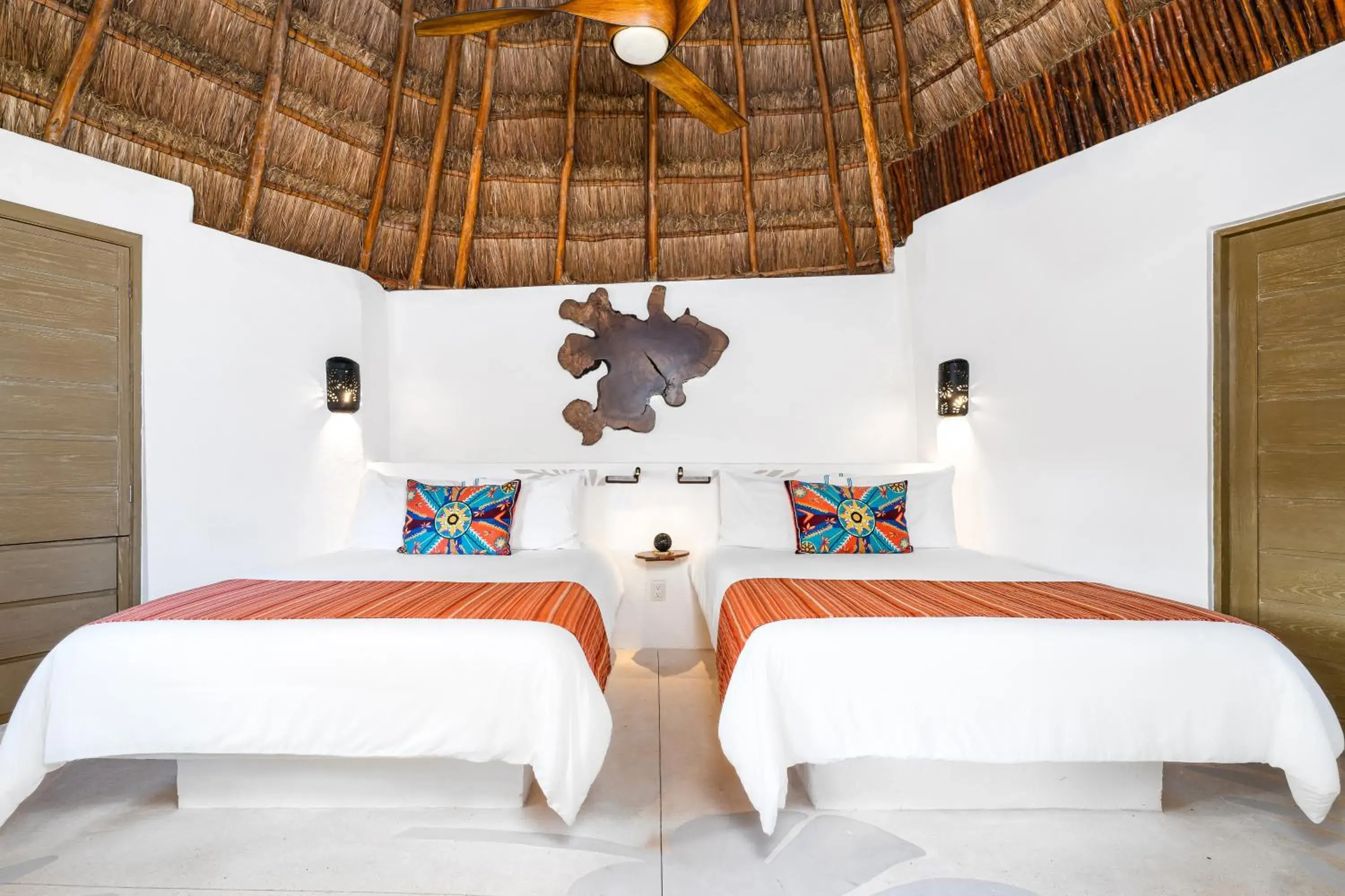 Bed in Mahekal Beach Front Resort & Spa Bed in Mahekal Beach Front Resort & Spa