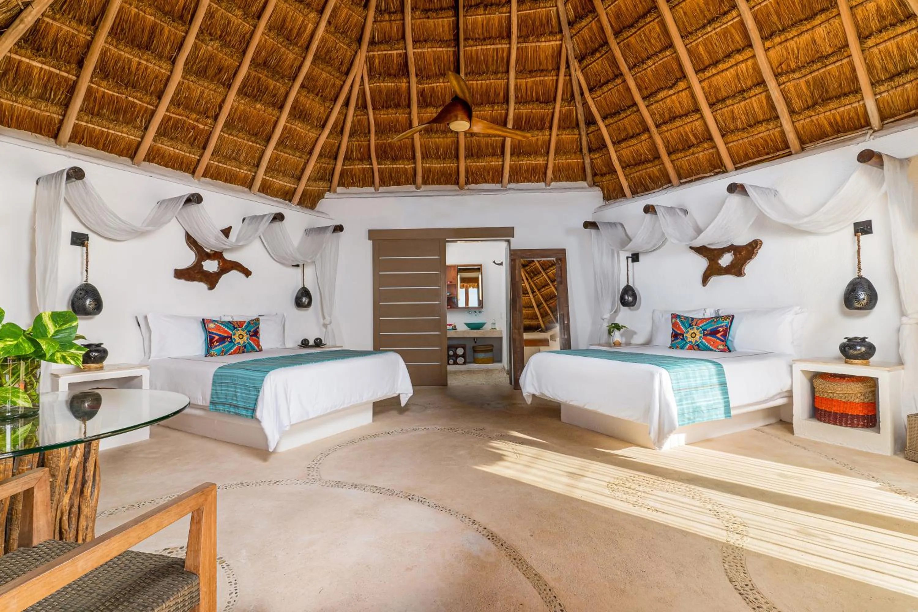 Bed in Mahekal Beach Front Resort & Spa