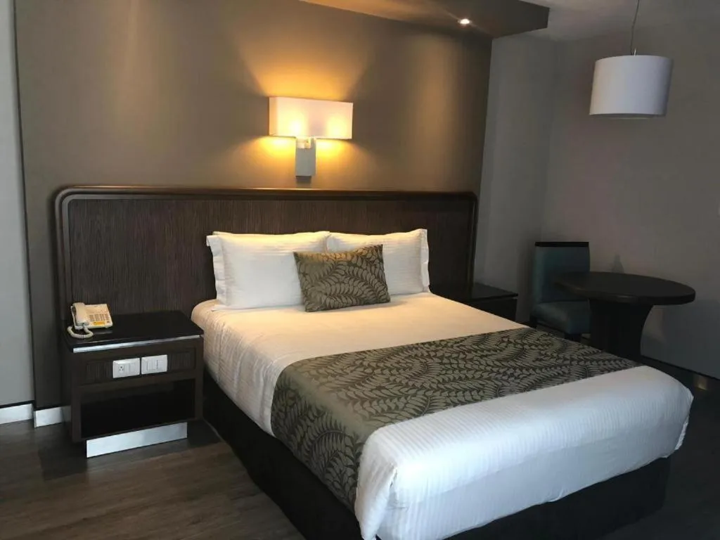 Bed in Hotel Metropol