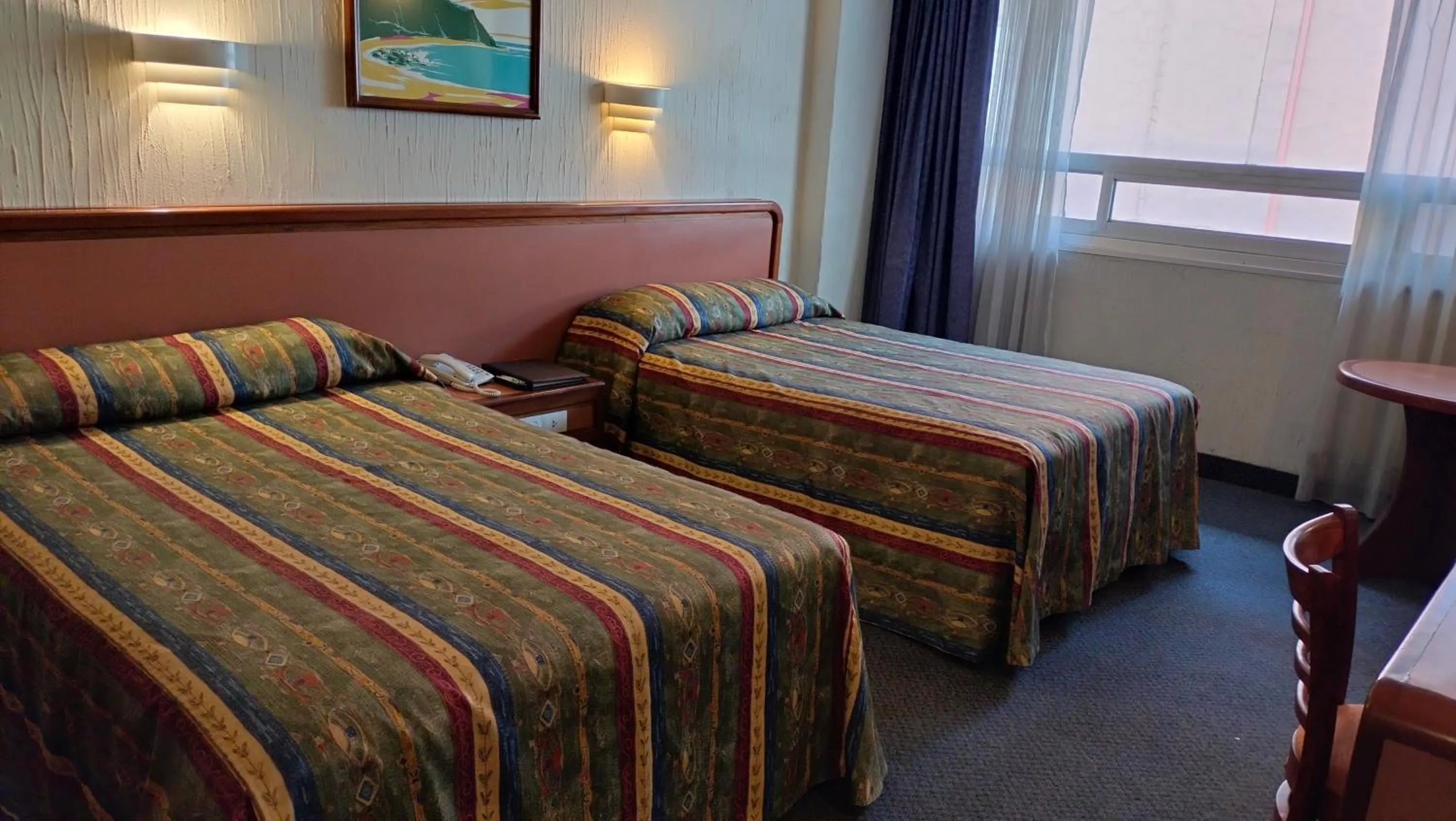 Bed in Hotel Metropol