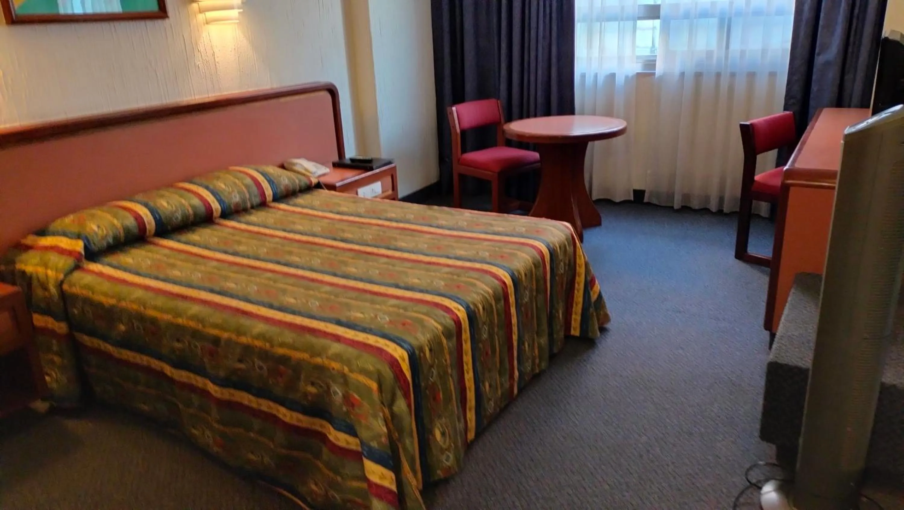 Bed in Hotel Metropol