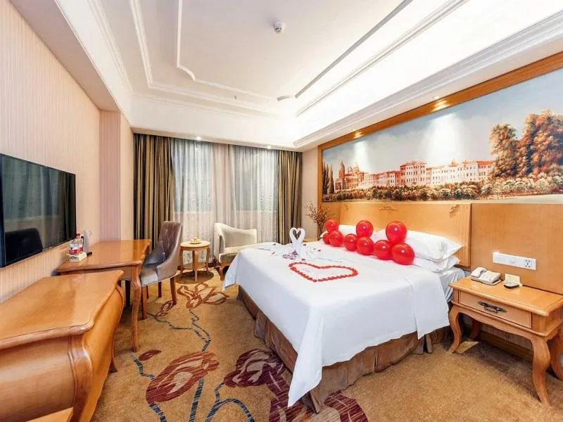 Bed in Vienna International Hotel Zhuzhou Railway Station Central Plaza