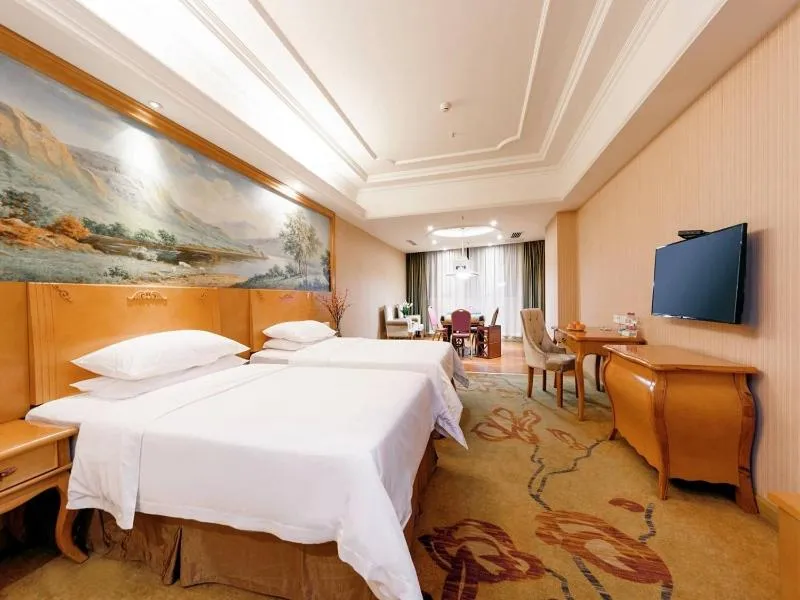 Bed in Vienna International Hotel Zhuzhou Railway Station Central Plaza
