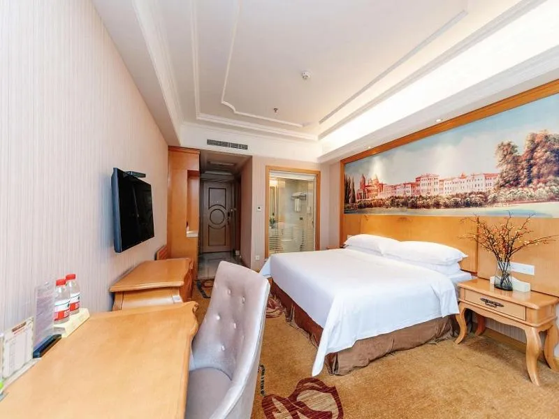 Bed in Vienna International Hotel Zhuzhou Railway Station Central Plaza