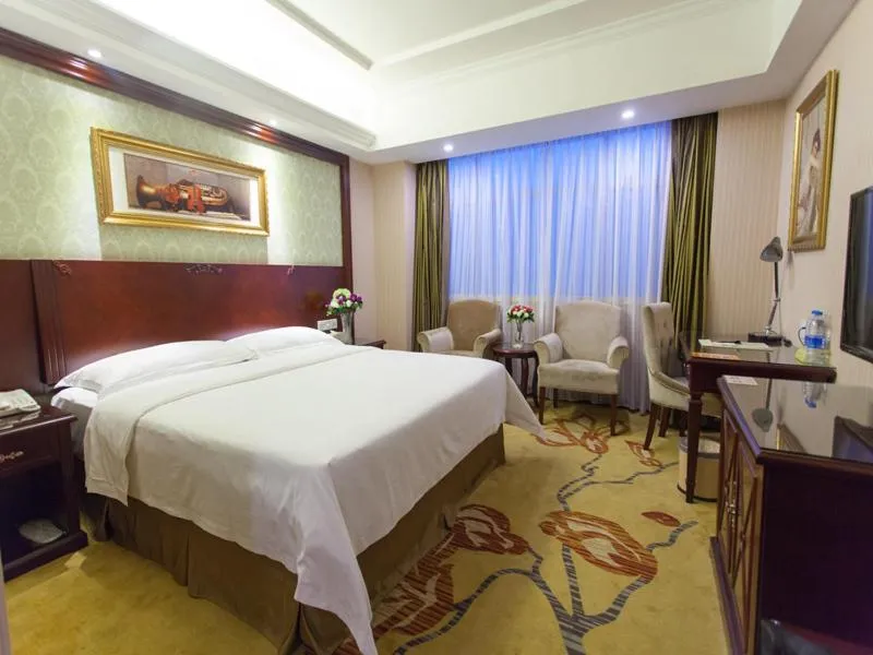 Bed in Vienna Hotel Guangzhou Jinshazhou