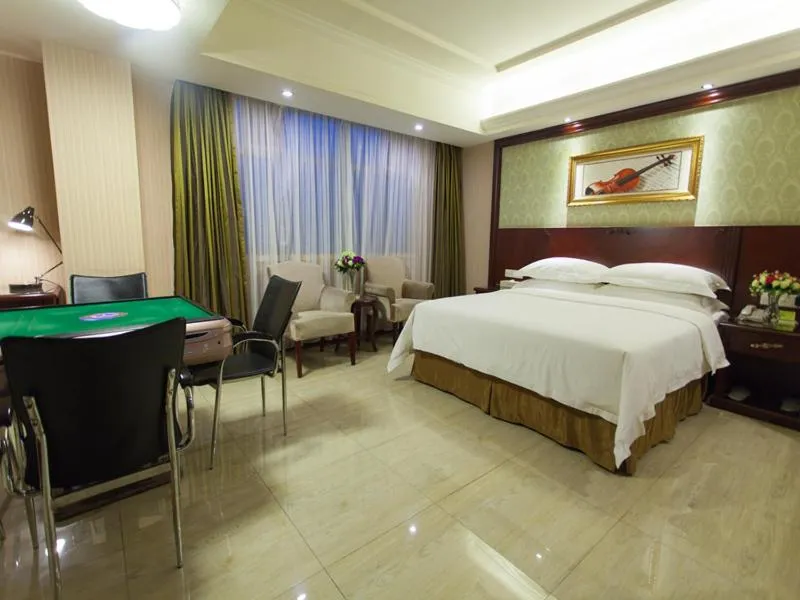 Bed in Vienna Hotel Guangzhou Jinshazhou
