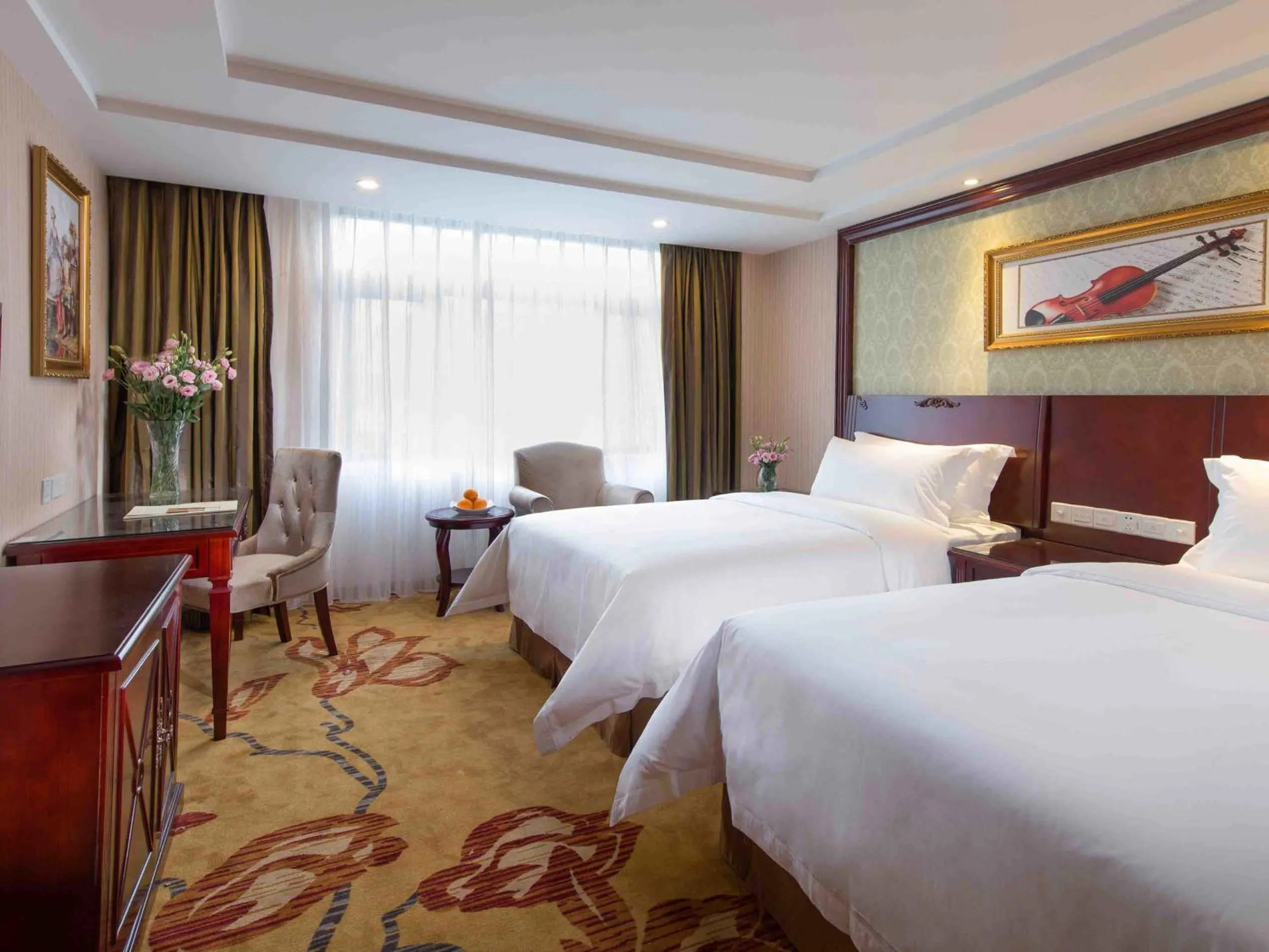 Bed in Vienna Hotel Guangzhou Jinshazhou