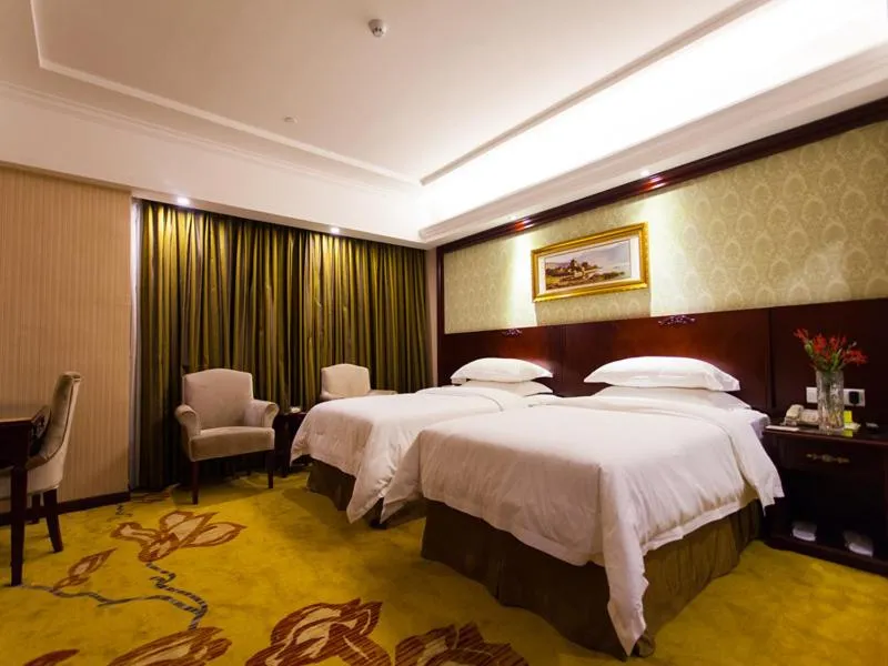 Bed in Vienna Hotel Guangzhou Jinshazhou