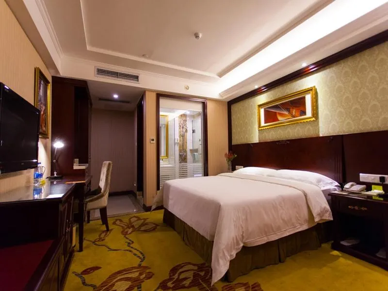 Bed in Vienna Hotel Guangzhou Jinshazhou