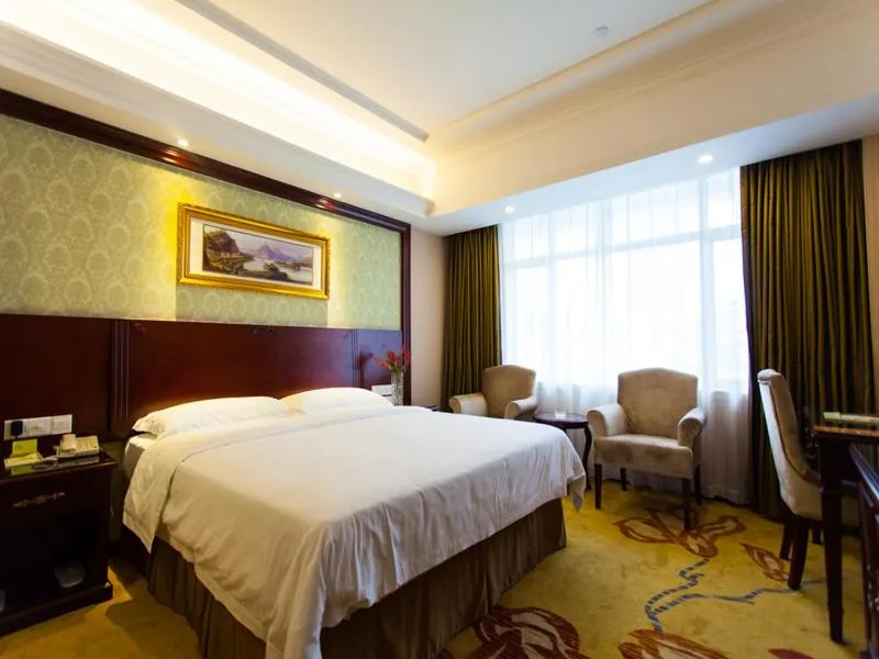 Bed in Vienna Hotel Guangzhou Jinshazhou