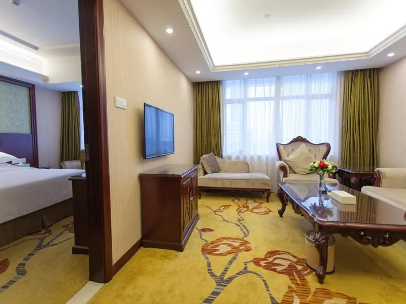 Bed in Vienna Hotel Guangzhou Jinshazhou
