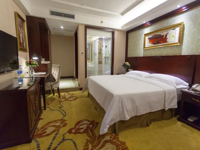 Bed in Vienna Hotel Guangzhou Jinshazhou