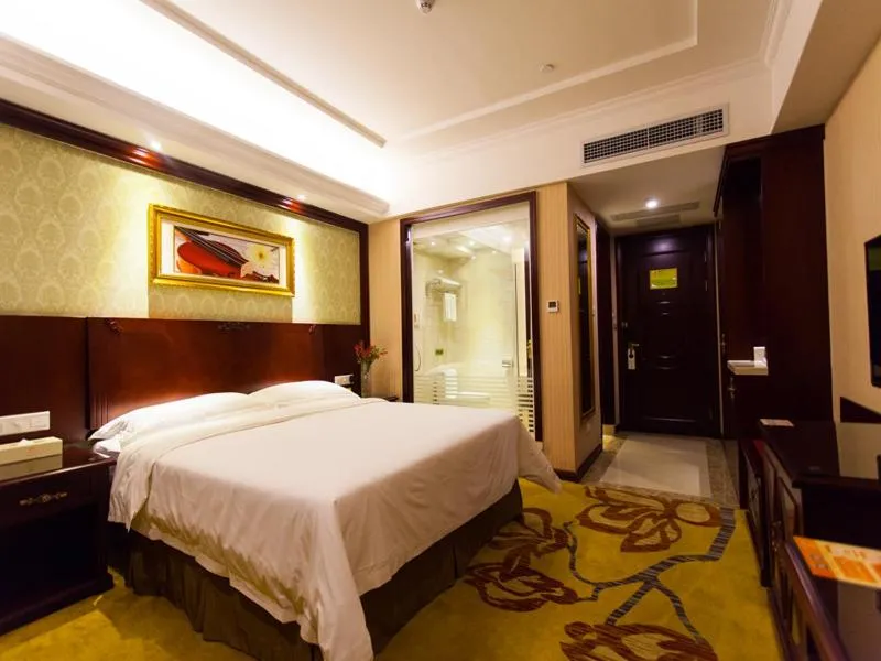 Bed in Vienna Hotel Guangzhou Jinshazhou