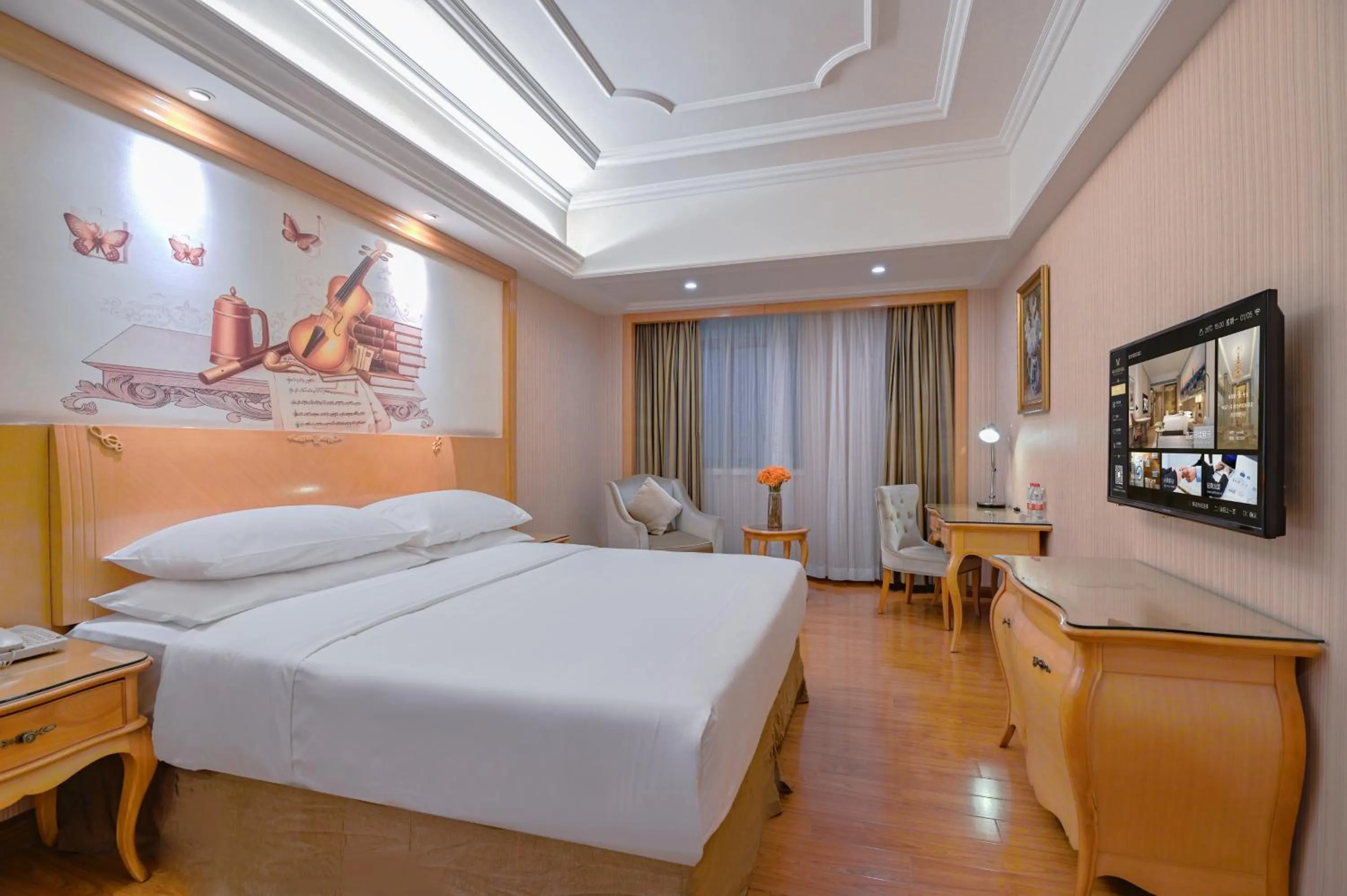 Bed in Vienna International Hotel Guangzhou Baiyun International Conference Center