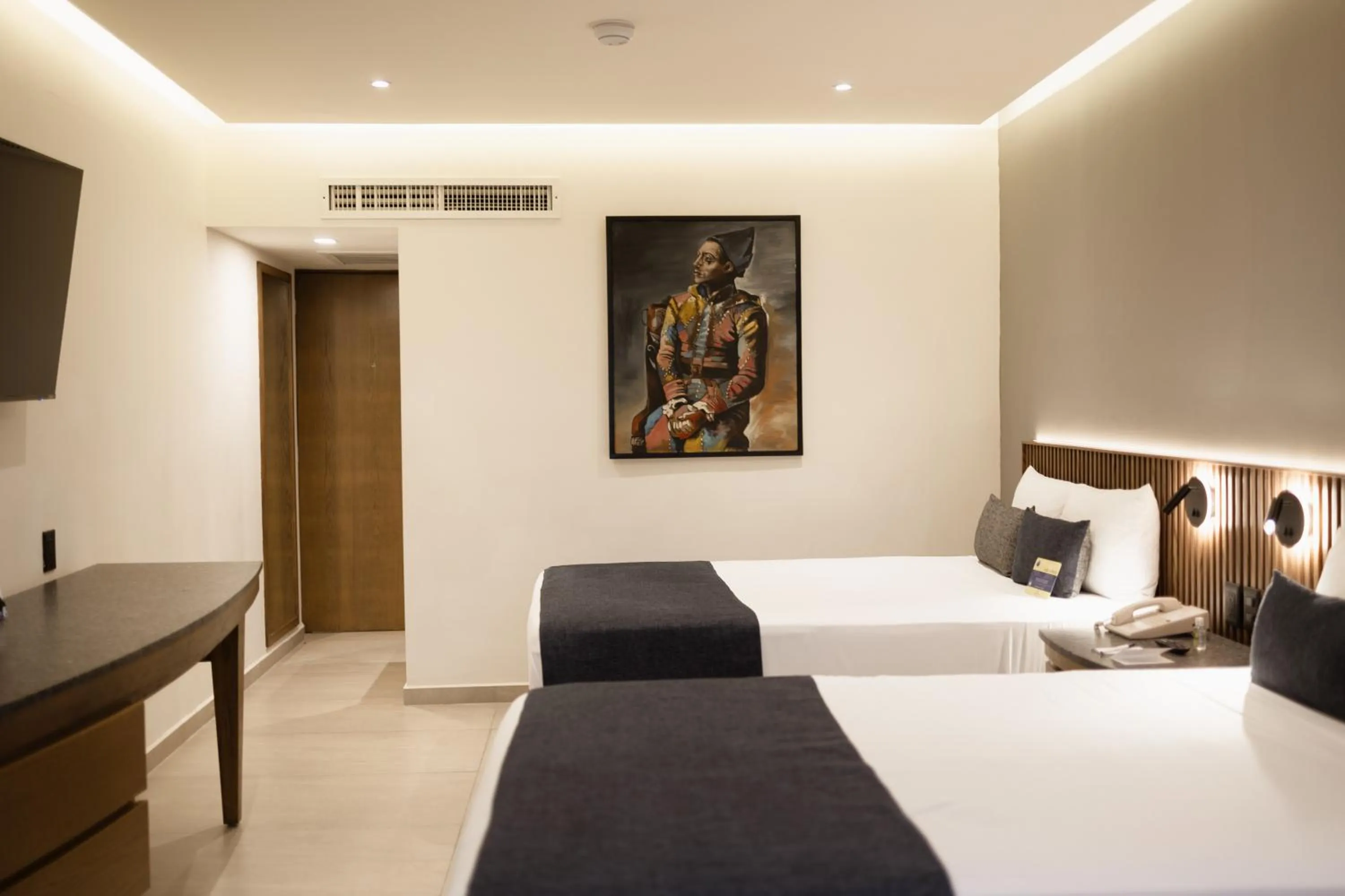 Bed in Hotel Guadalajara Plaza Ejecutivo