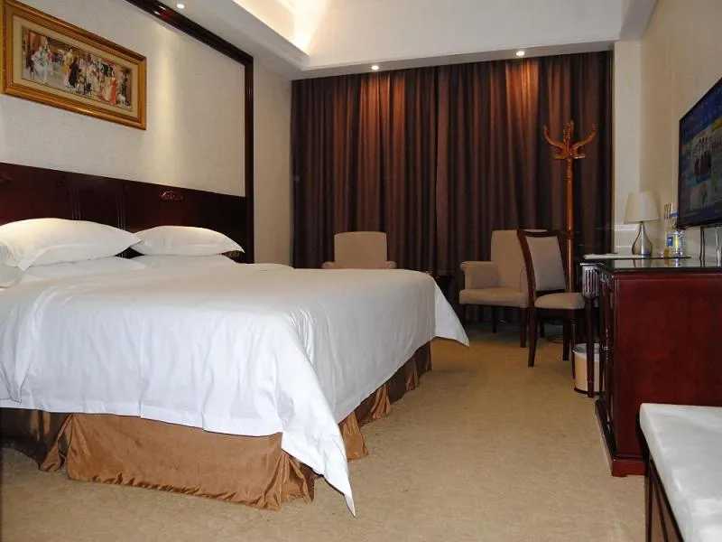 Bed in Vienna Hotel Shanwei Lufeng Jieshi Bus Station