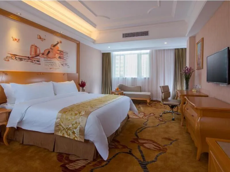Bed in Vienna Hotel Foshan Ceramic City