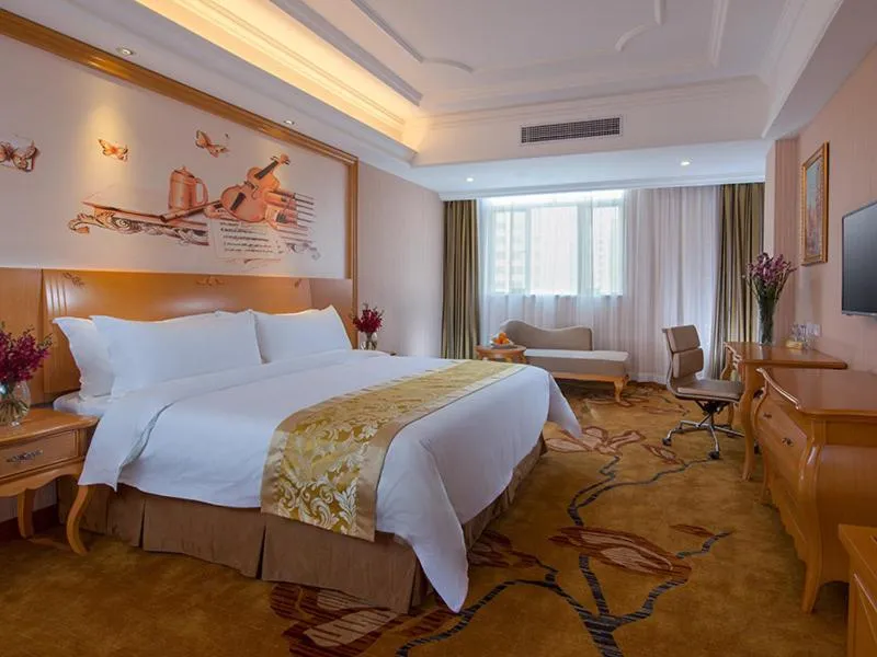 Bed in Vienna Hotel Foshan Ceramic City