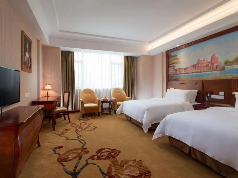 Bed in Vienna Hotel Puning South Huancheng Road High-Speed Train Station