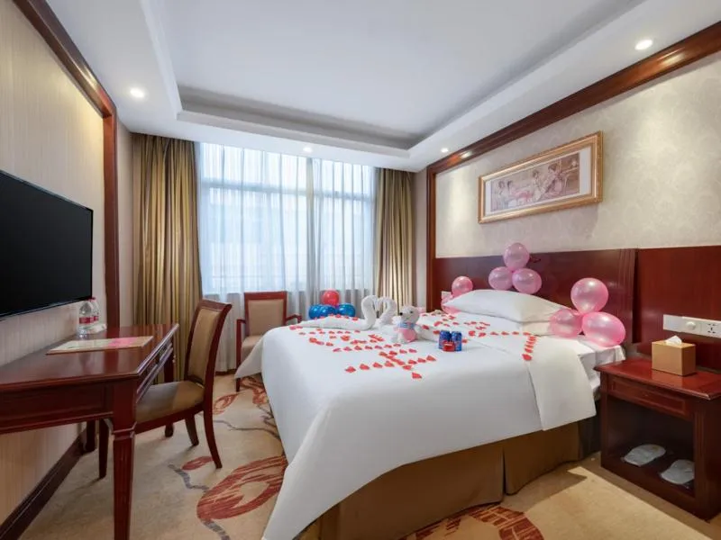 Bed in Vienna Hotel Shenzhen Guanlan Tangren Street