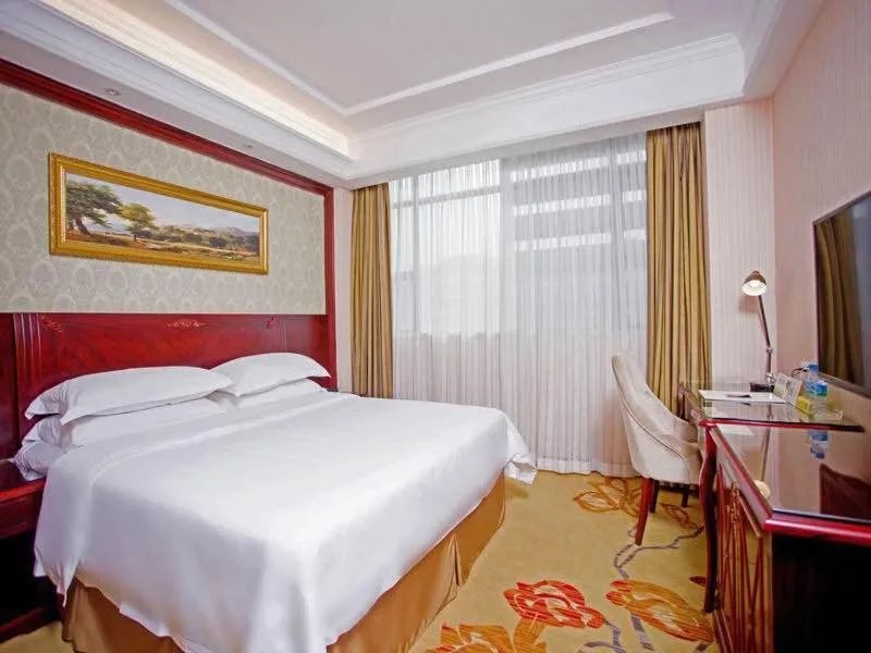 Bed in Vienna Hotel Shenzhen Shiyan Shilong Community