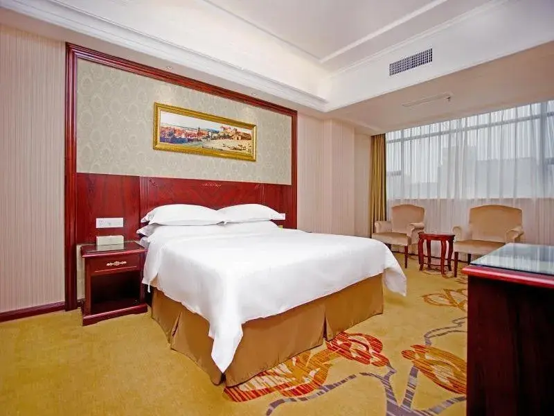 Bed in Vienna Hotel Shenzhen Shiyan Shilong Community Bed in Vienna Hotel Shenzhen Shiyan Shilong Community