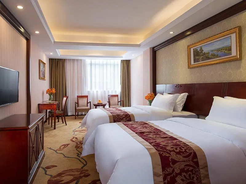 Bed in Vienna Hotel Shenzhen Shiyan Shilong Community