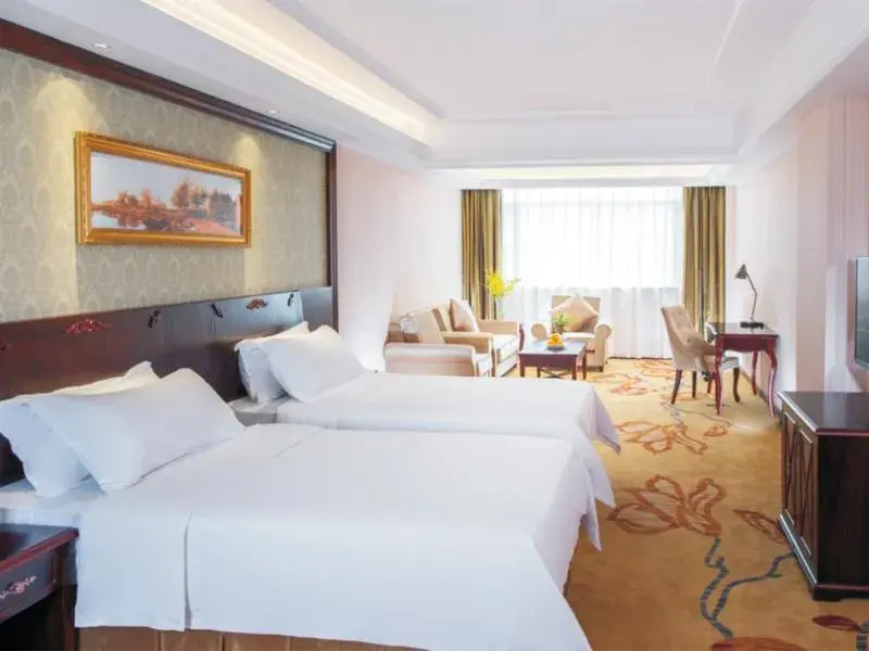 Bed in Vienna Hotel Shenzhen Shiyan Shilong Community Bed in Vienna Hotel Shenzhen Shiyan Shilong Community