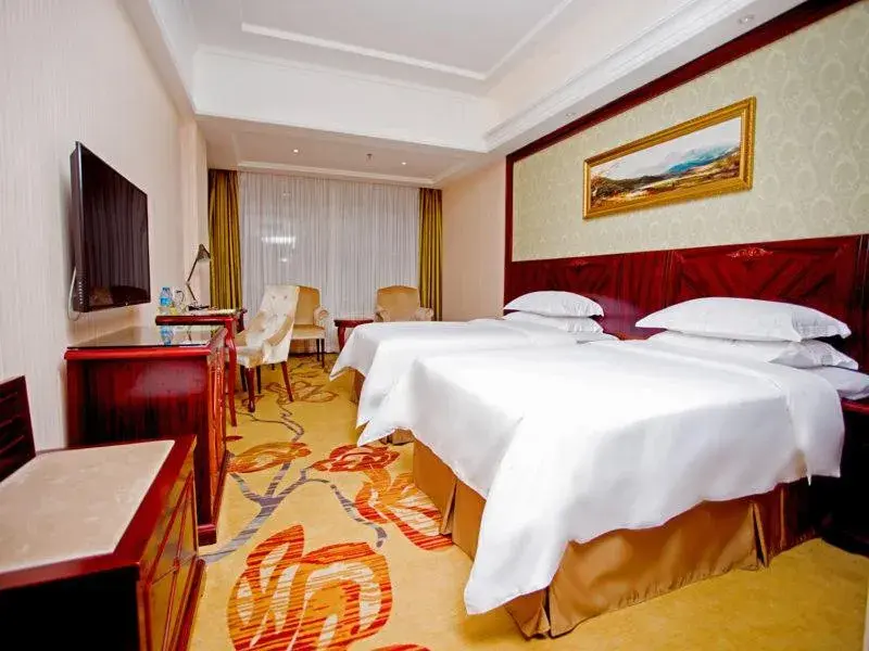 Bed in Vienna Hotel Shenzhen Shiyan Shilong Community Bed in Vienna Hotel Shenzhen Shiyan Shilong Community