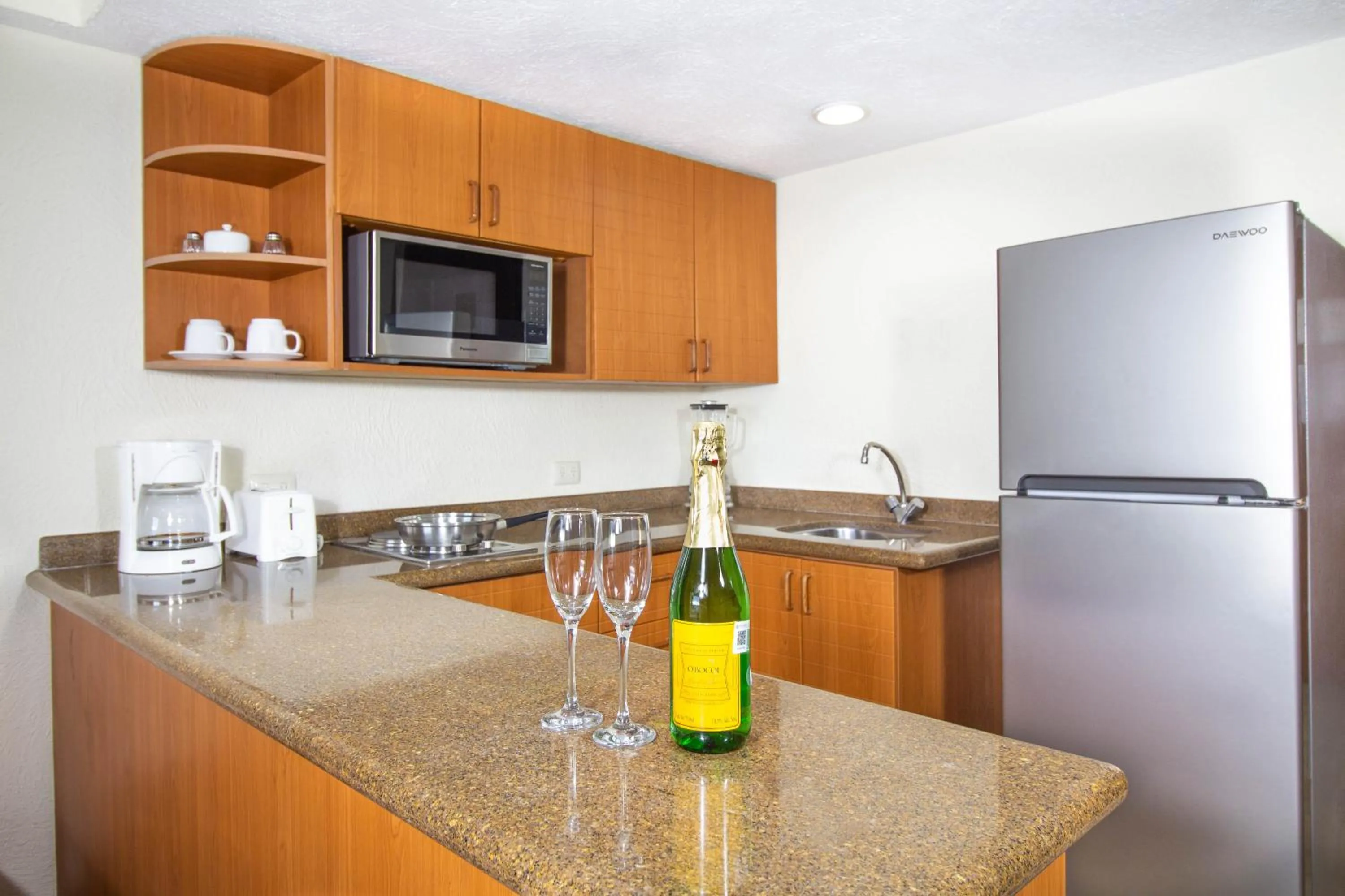 Kitchen or kitchenette in Plaza Pelicanos Grand Beach Resort All Inclusive