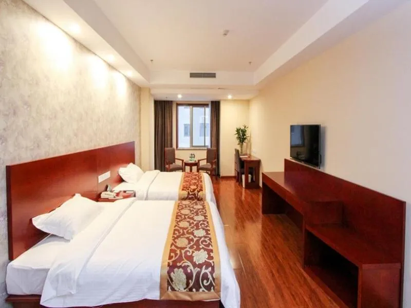 Bed in GreenTree Inn Shandong Zaozhuang Tengzhou East Xueyuan Road Guiheyuan Business Hotel