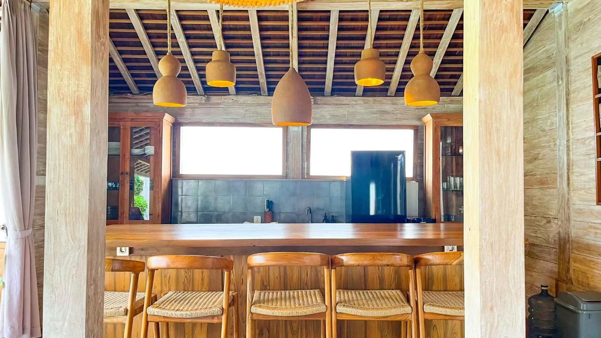 Kitchen or kitchenette in Villa Du Bah - Cozy Tropical 3BR Villa 12min To Beach